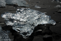 Ice on black beach